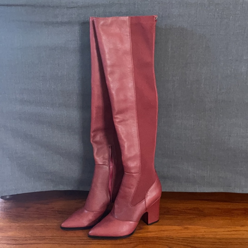 Over the knees fitted dark red boots